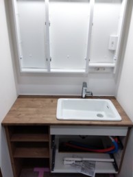 木の質感やぬくもりを感じられる木目調でスタイリッシュに　目黒区M様邸